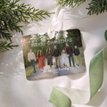 Montana Haven ceramic Christmas ornament with an ivory satin ribbon, printed with the Miller family's 2026 photo, Merry Christmas and The Miller Family 2026